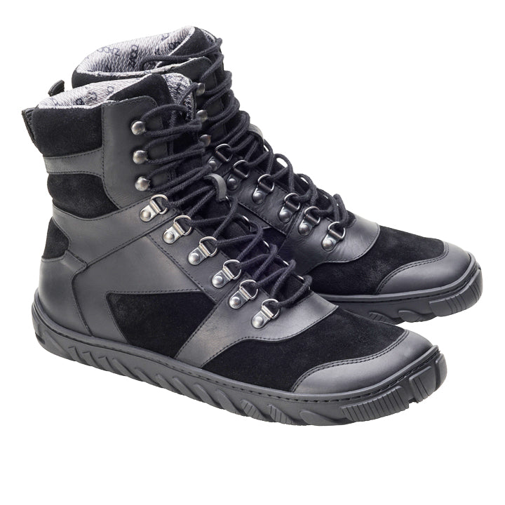 The ZAQQ EXPLORER Black Waterproof boots feature mixed leather and suede panels, metal eyelets and hooks for lace-up, a textured rubber sole for support and a stylish patterned gray fabric lining. Perfect as your outdoor buddy.