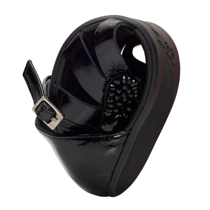 The black shoe QISELLE from ZAQQ features a distinctive spiral shape, enhanced by a strap and buckle. Reminiscent of an artistic interpretation of sandals, this sophisticated design offers both style and comfort with its textured insole.