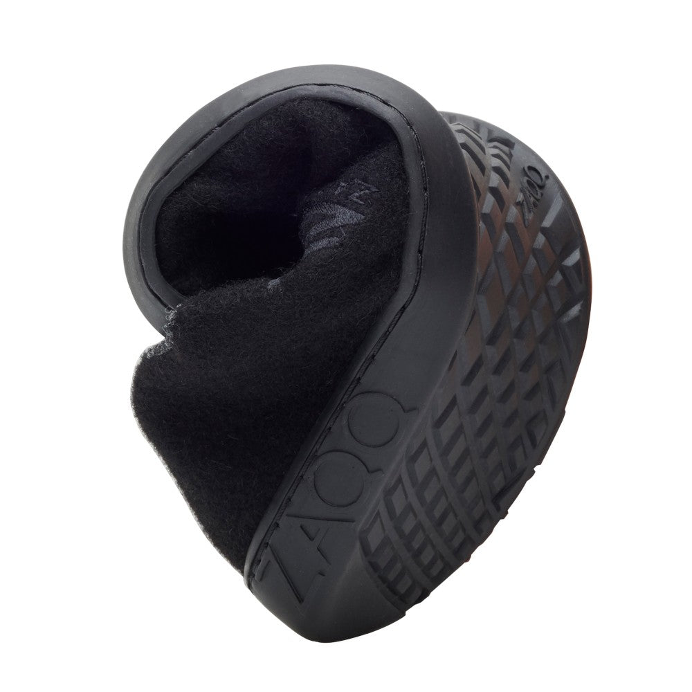 Shown is a single black LIQE barefoot shoe with its inwardly curved flexible sole highlighting the textured profile and soft Merino wool lining, whilst displaying the brand name ZAQQ is clearly visible on the heel.