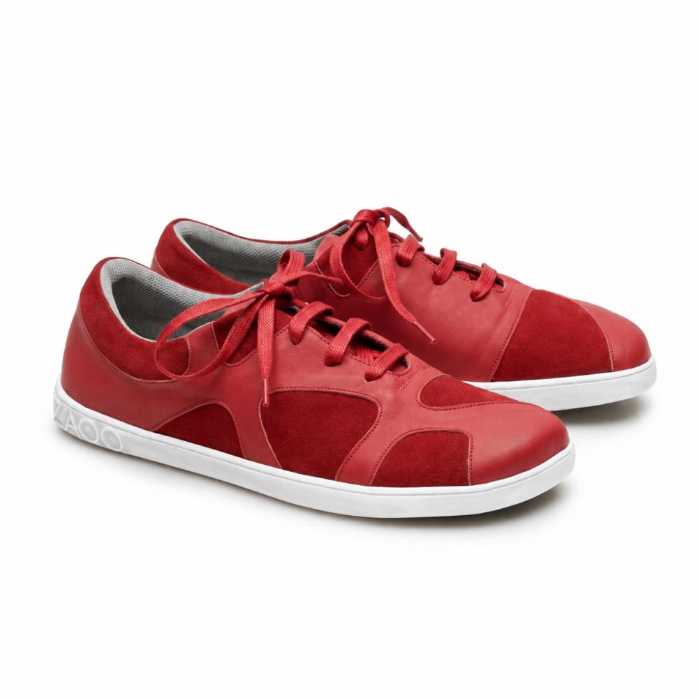 The QAANAAQ Bordeaux sneakers from ZAQQ are crafted from nappa and suede leather and feature a white zero-drop rubber sole and matching red laces.