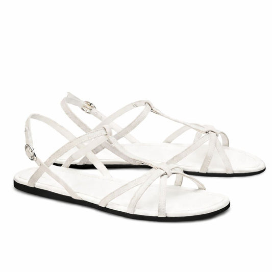 Entdecken Sie die weißen QADA-Sandalen von ZAQQ, die mit minimalistischer Eleganz entworfen wurden. Diese Barfußsandale aus hochwertigem Nappaleder zeichnet sich durch dünne Riemen aus, die sich über den oberen Teil und den Knöchel kreuzen und mit einer seitlichen Schnalle versehen sind. Die flachen Sohlen spiegeln Einfachheit und Stil wider.