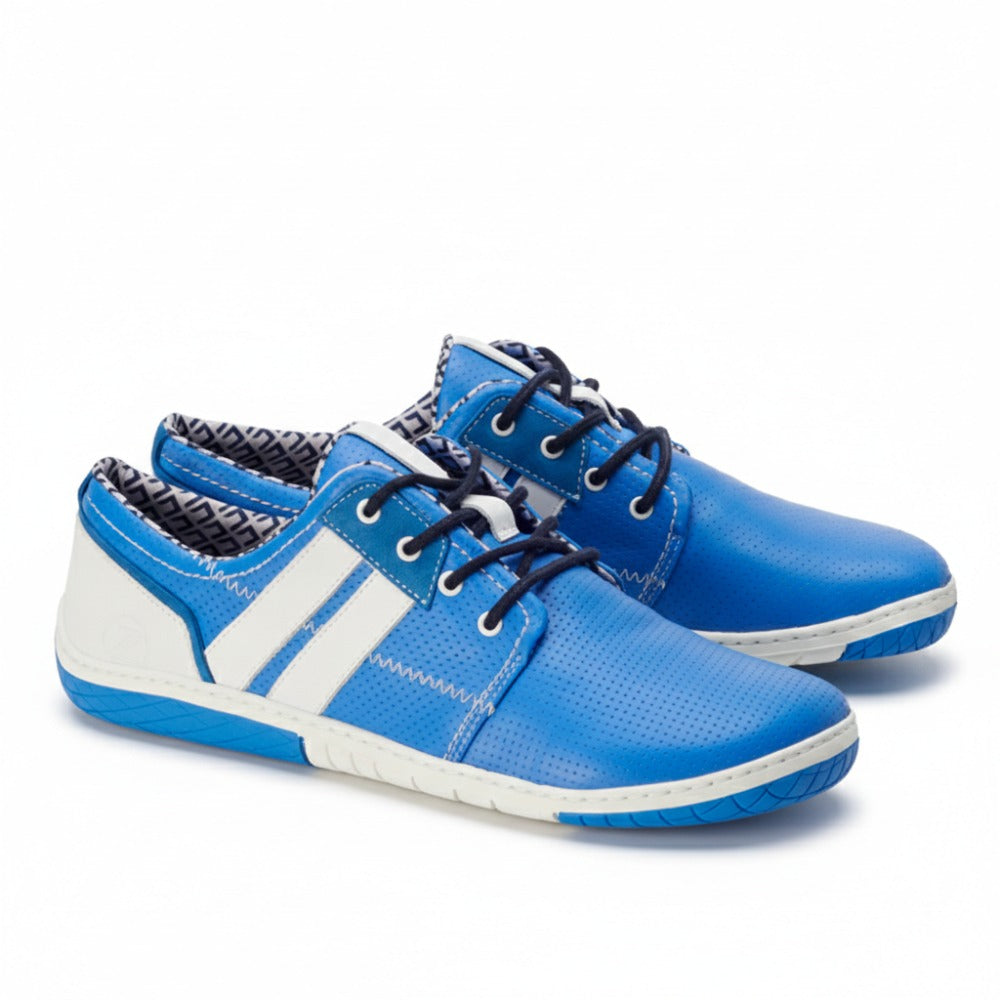 Introducing the QAPETOWN Blue sneakers from ZAQQ Featuring a stylish blue design with white accents and black laces, complemented by a striking patterned lining. These sneakers have a textured sole for better grip and are breathable to ensure all-day comfort.