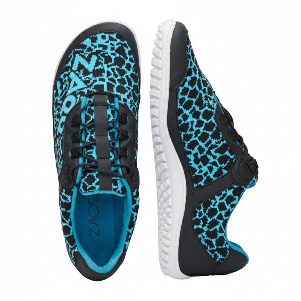 A pair of stylish QINGSTON Turquoise running shoes from ZAQQ is shown from above and from the side. The shoes feature a black and blue geometric pattern, elastic laces and textured black and white vegan mesh soles for optimal comfort.