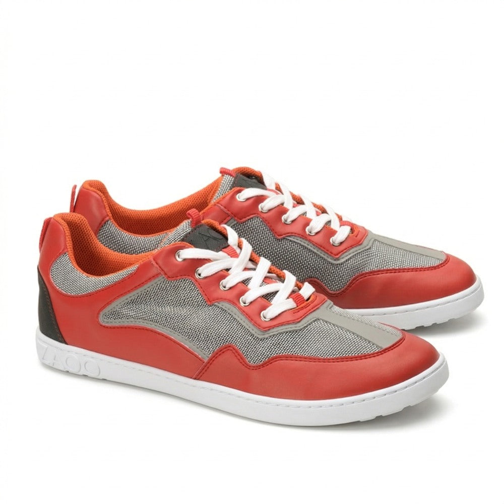 A couple ZAQQ QOPA Red sneakers in red and gray with white laces and orange accents. These breathable shoes have a textured sole and mesh fabric to ensure optimal air circulation. They are elegantly presented side by side against a pristine white background.