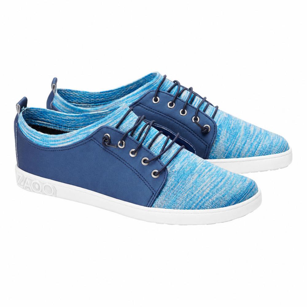The QRIS Blue Sneakers from ZAQQ are crafted from textured fabric and dark blue inserts to ensure all-day breathability. These stylish barefoot shoes feature white soles with a unique design and dark blue laces threaded through metallic eyelets, making them ideal for any casual outing.