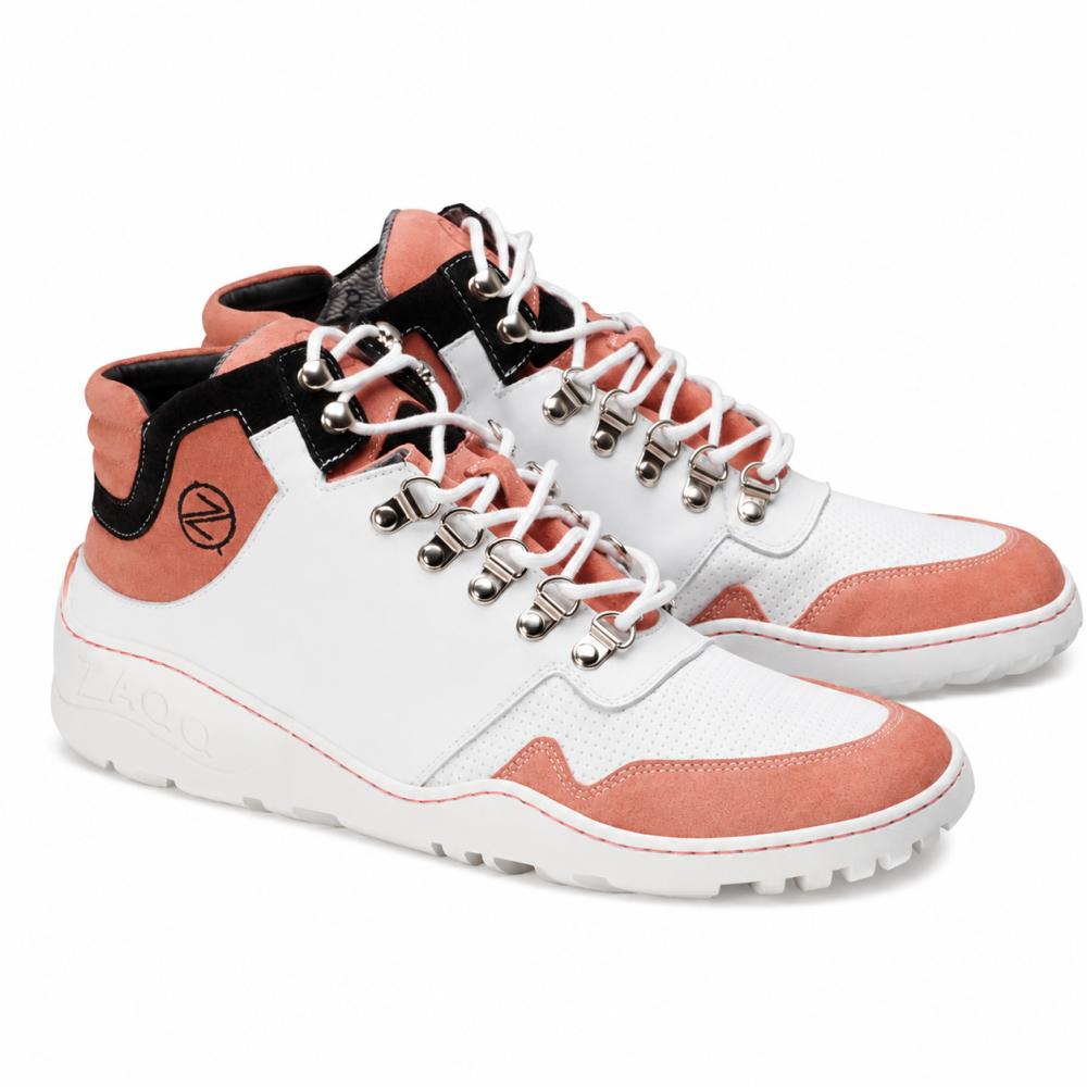 A pair of ZAQQ high-top sneakers in a strikingly modern design featuring a mix of white, pink, and black tones. These sneakers boast silver eyelets, padded collars for added comfort, and textured soles adorned with a distinctive stylized Z-logo on the side. The VAQATION Pink Waterproof Edition ensures durability in any weather without compromising on style.